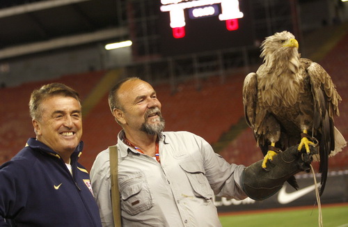 Serbian Soccer Coach With the Teams Mascot (The White Eagles)